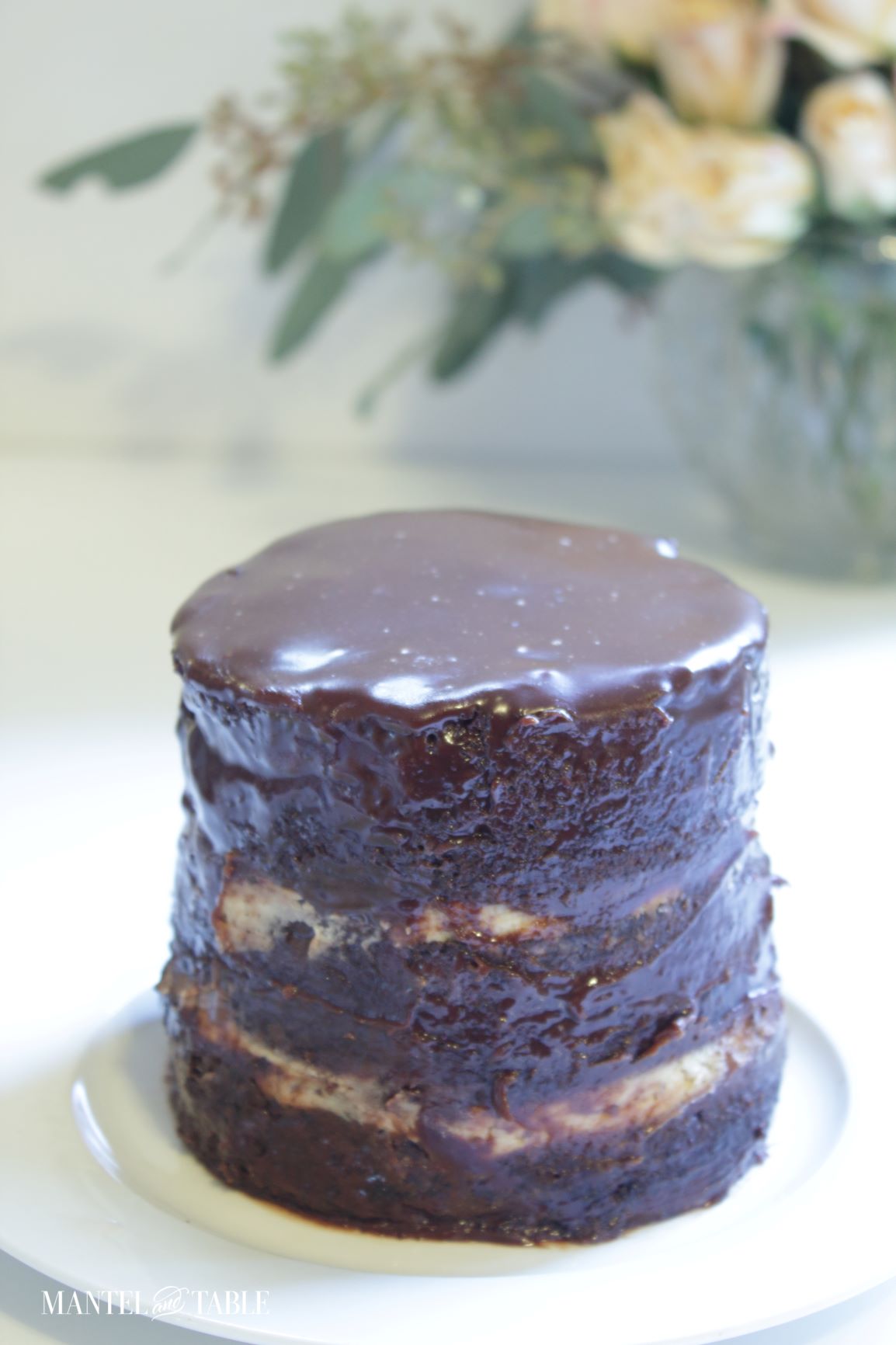 Tiny "semi-naked" cake with peanut butter filling showing through