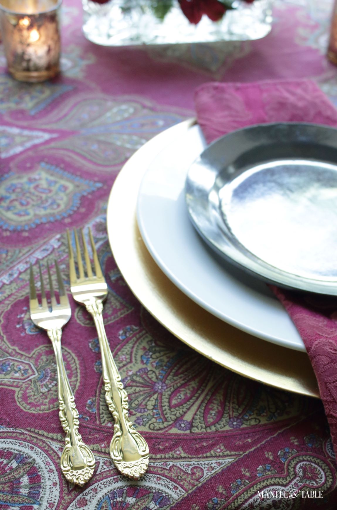 Cozy tablescape ~ closeup of gold forks, plate stack