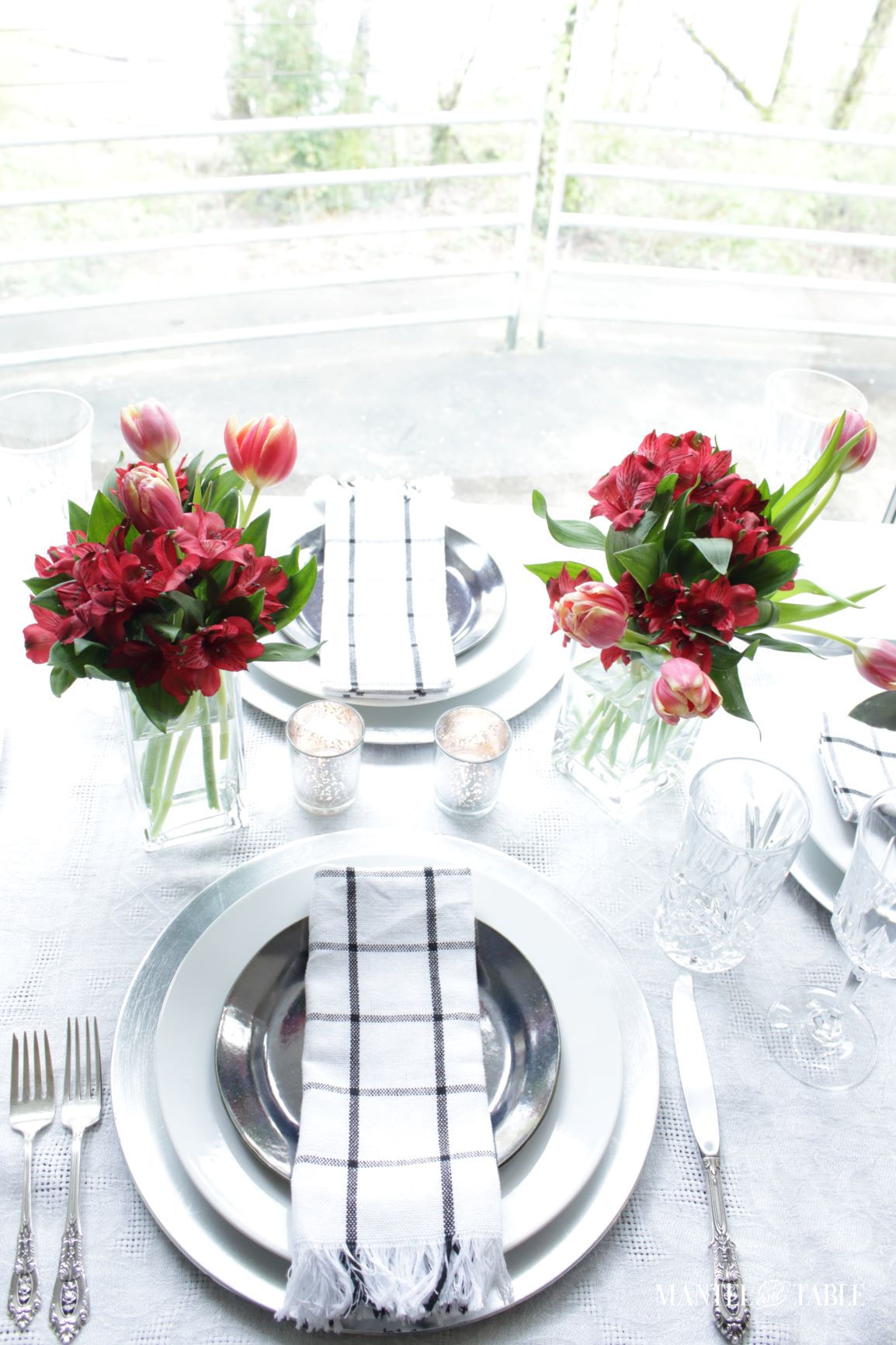 Elegant Spring Picnic tablescape plate stack with napkin on top