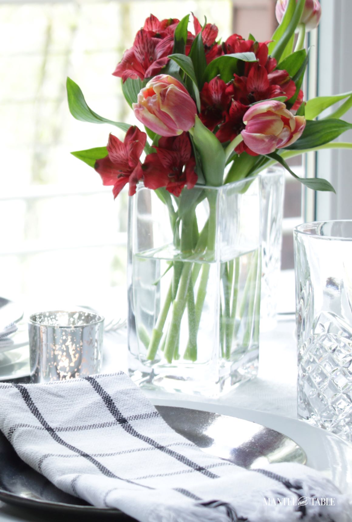 Elegant Spring Picnic tablescape closeup of flower arrangement