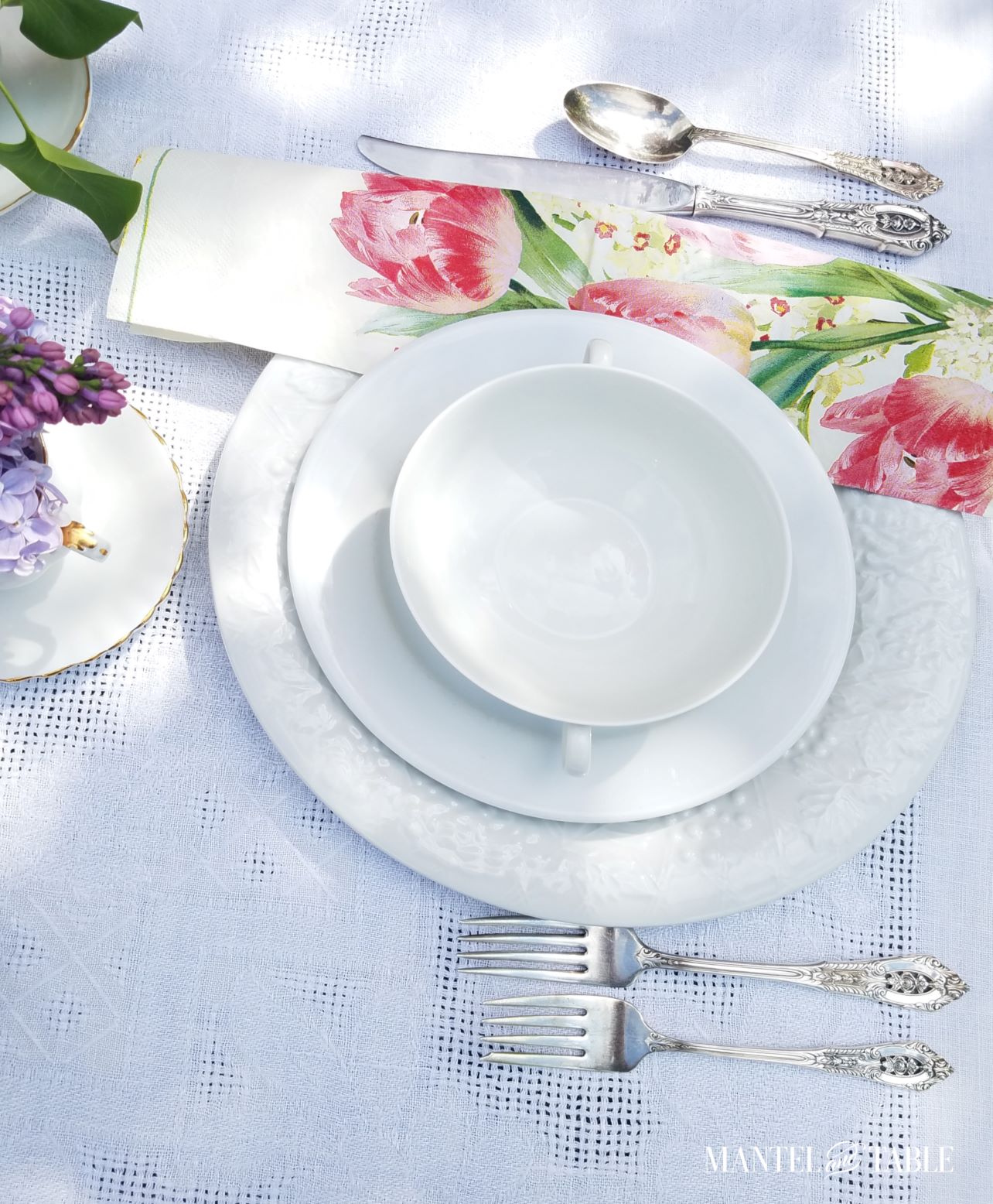 Bright spring tablescape ~ plate stack and napkin