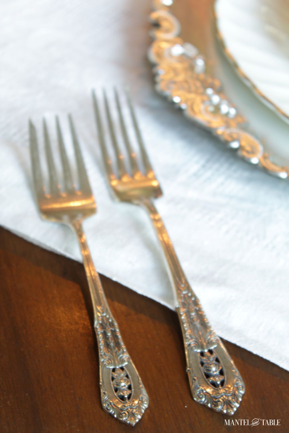Red Rose Tablescape closeup of silver forks