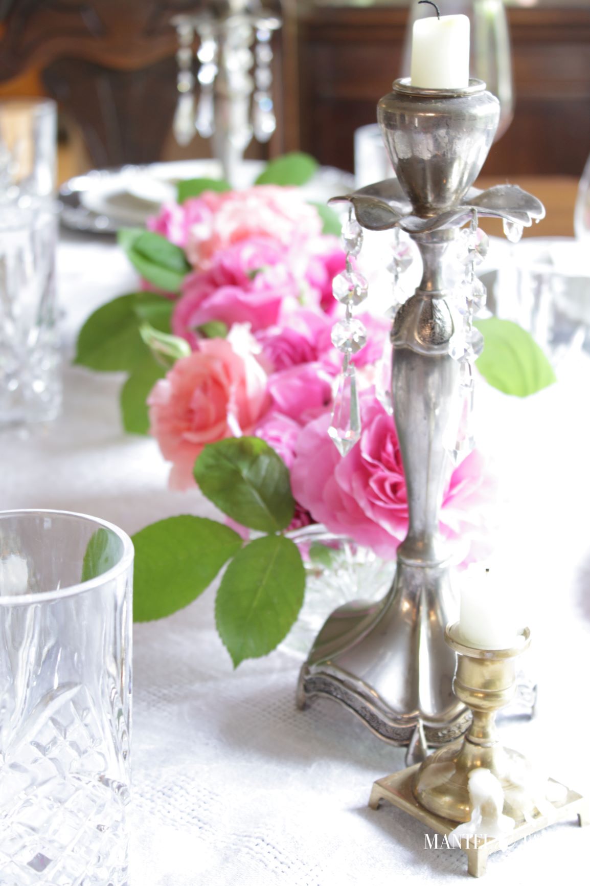 Silver and Gold Table Setting ~ closeup of silver candlesticks