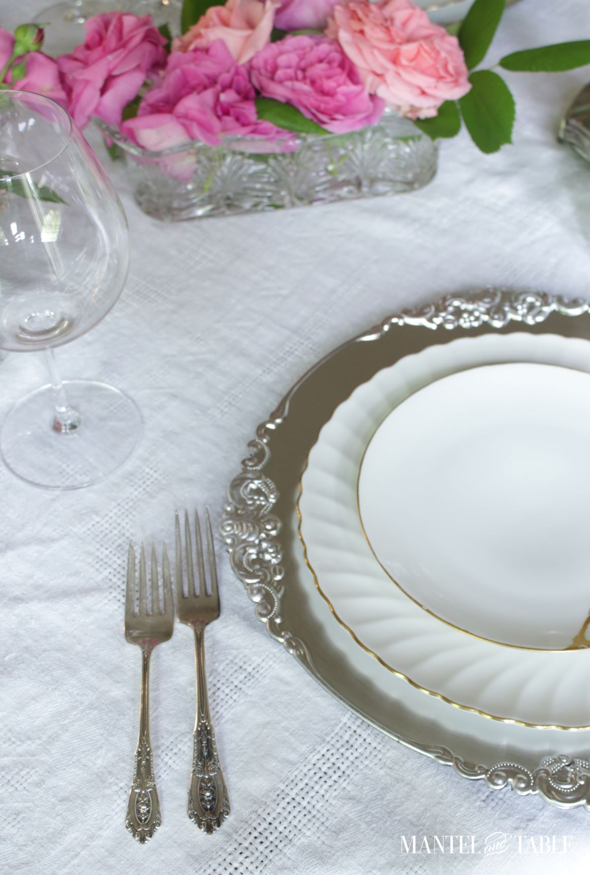 Silver and Gold Table Setting ~ plate stack and silver forks