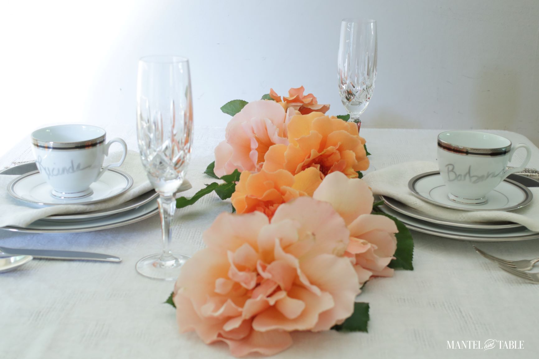 Two place settings with teacup place card