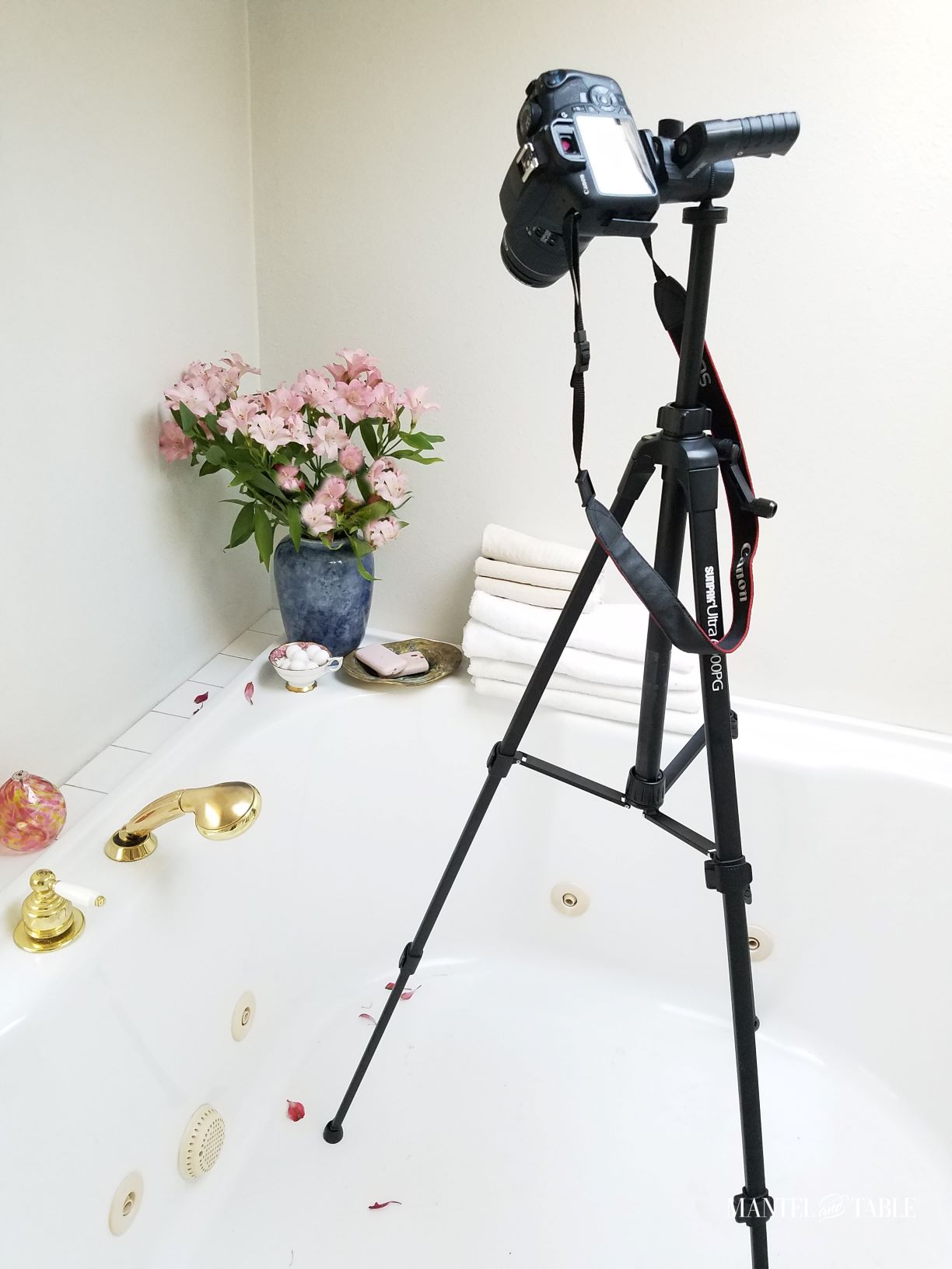 Camera on tripod in bathtub