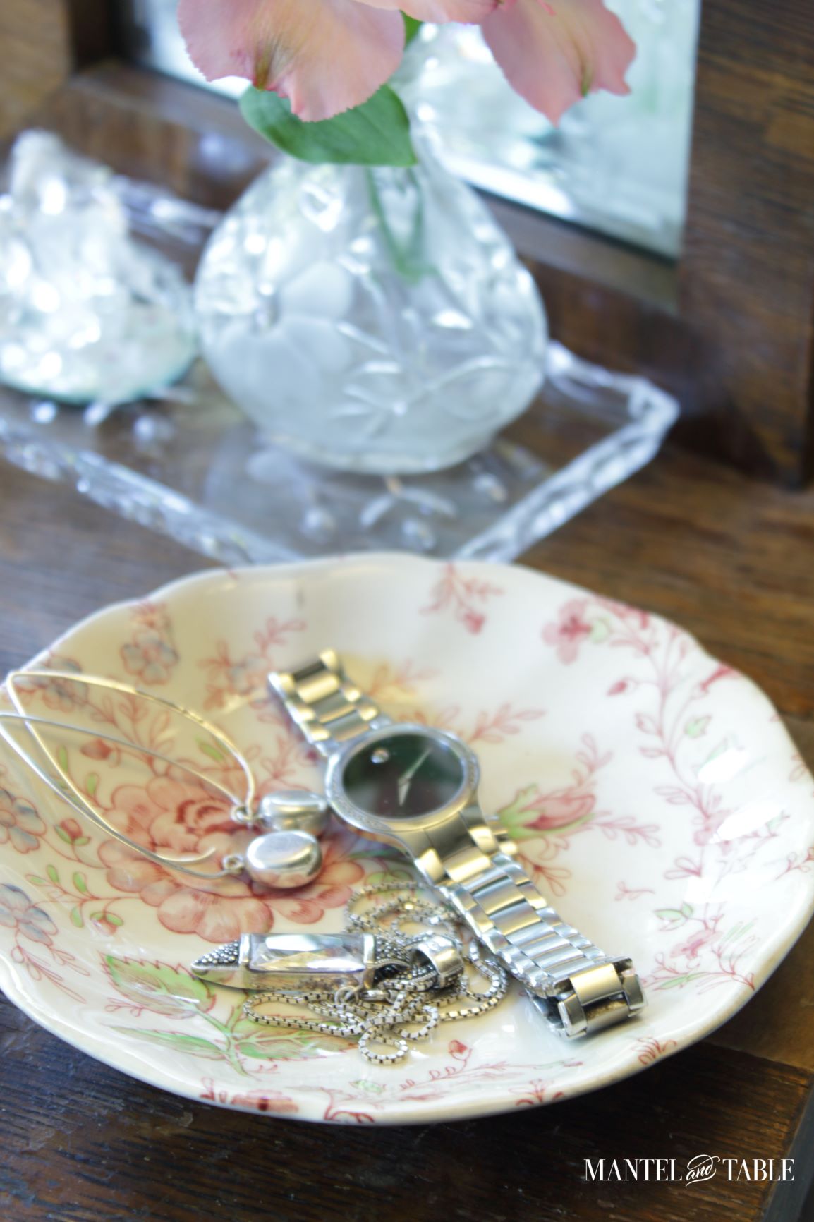 Rose Chintz saucer holding jewelry on dressing table