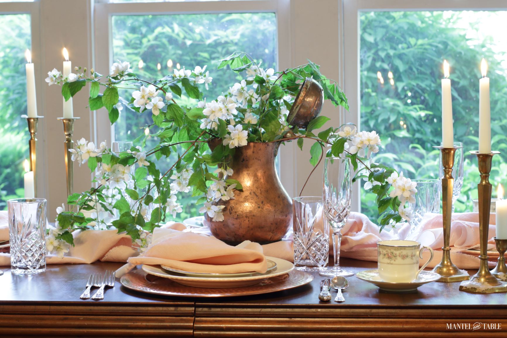 Blush table linens and copper tablescape