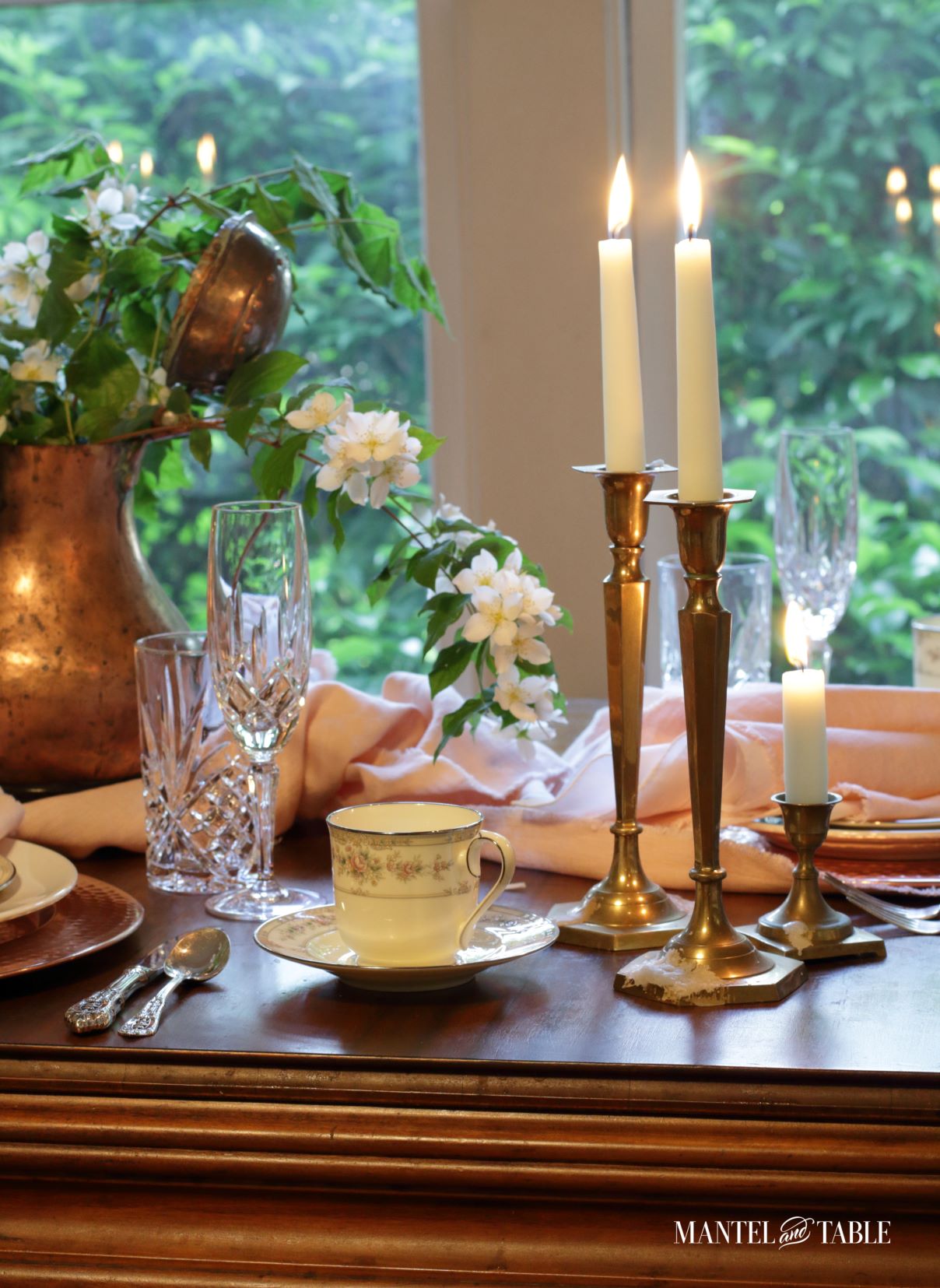 Blush table linens with candles