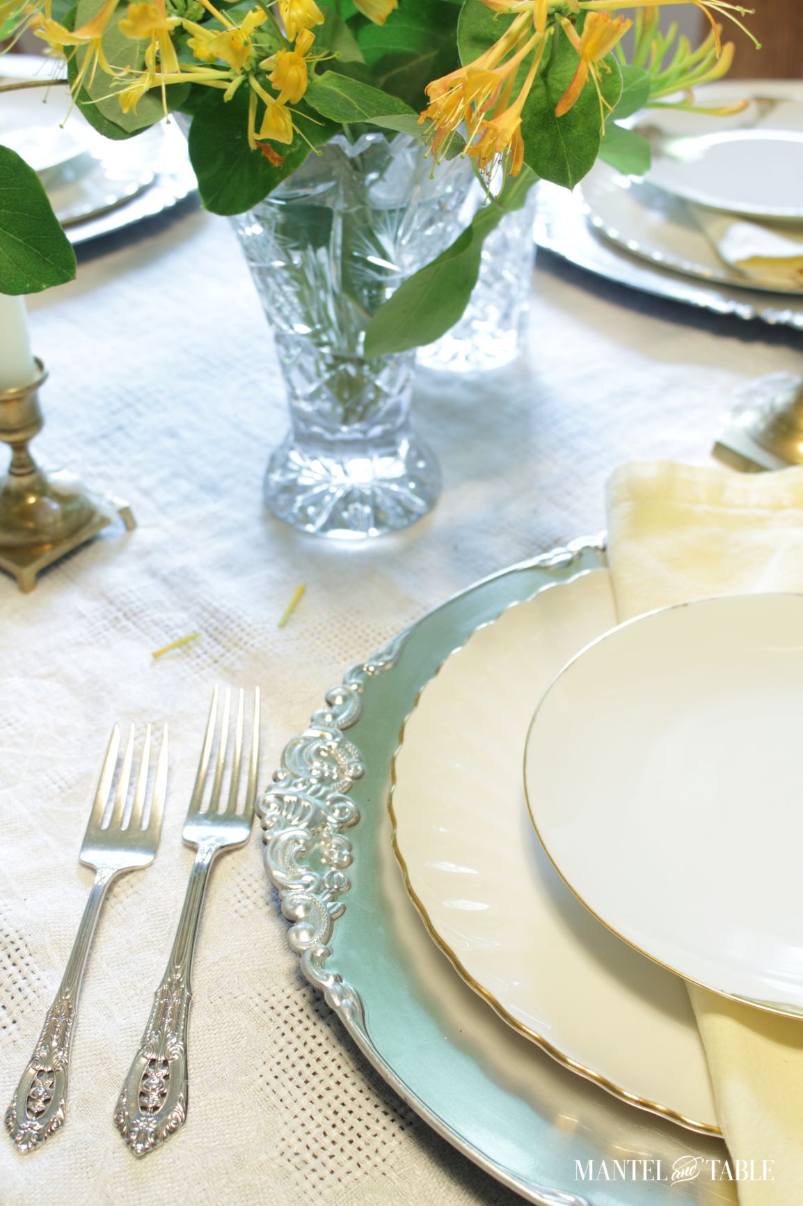 Plate stack with closeup of silver charger