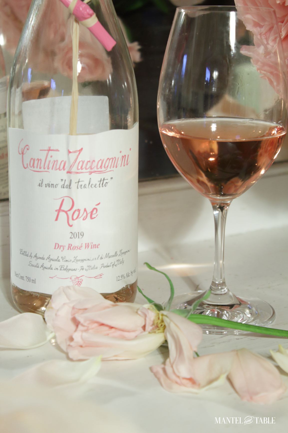 Wine bottle and rosé wine in a glass