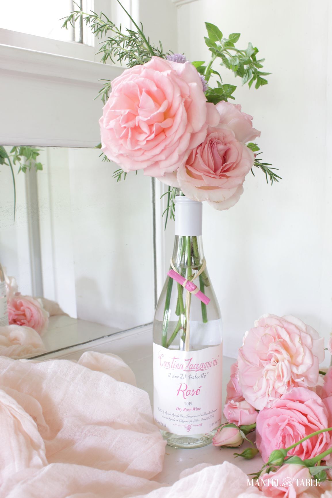 Pink rose flower arrangement on white counter