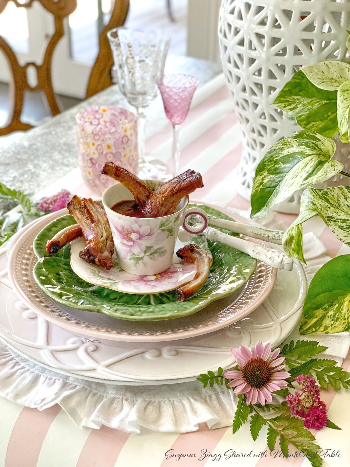 BBQ ribs in a teacup and beautiful place setting