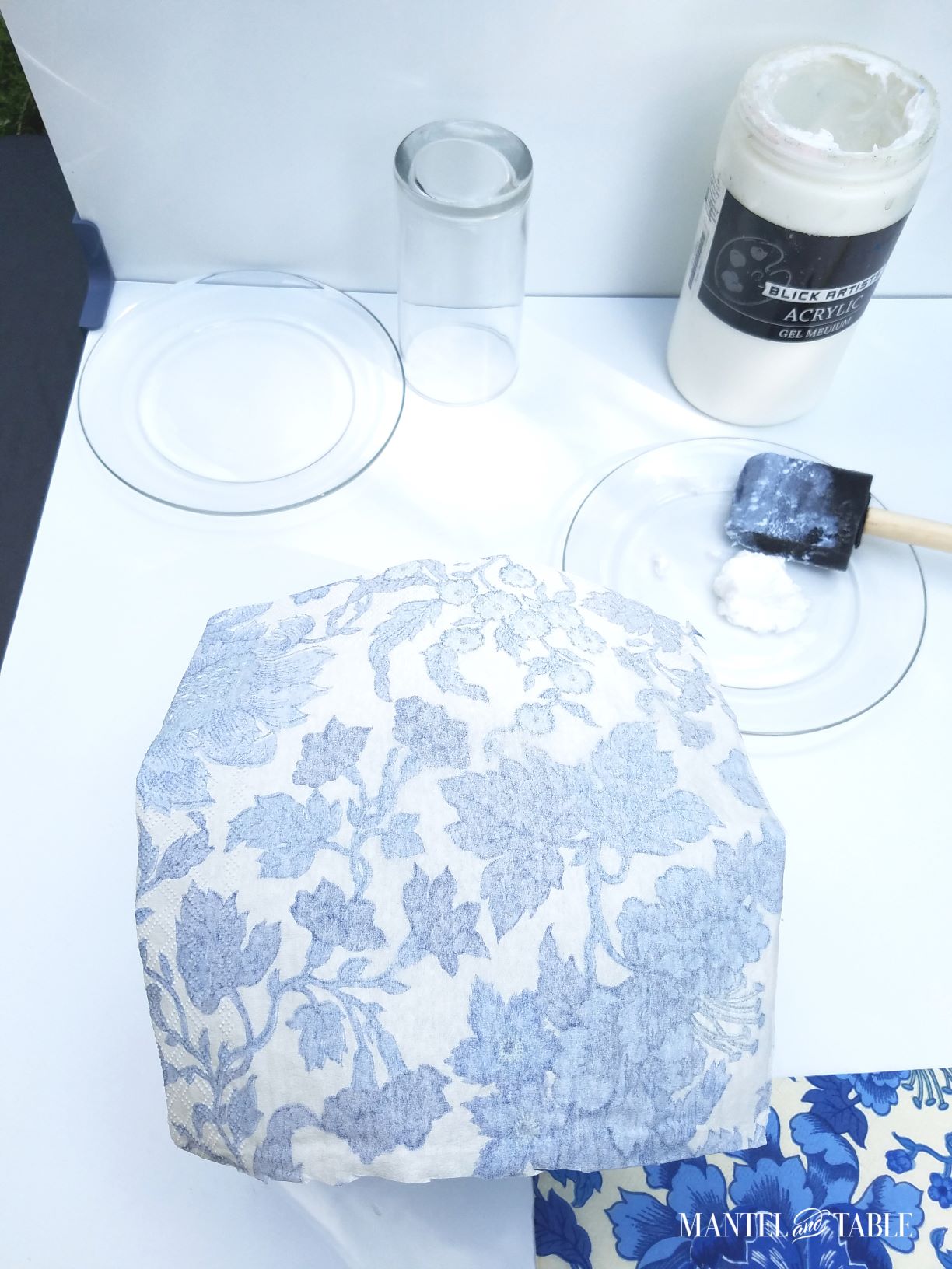 Upside down DIY plate with napkin laid over it