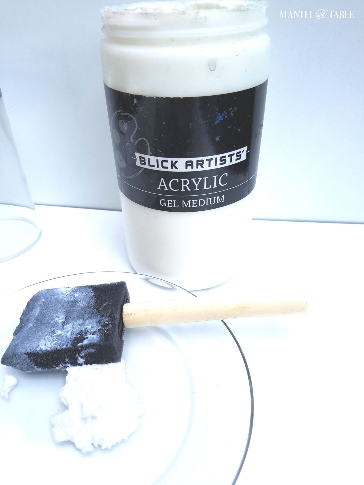 Closeup of the acrylic medium bottle for the DIY plate
