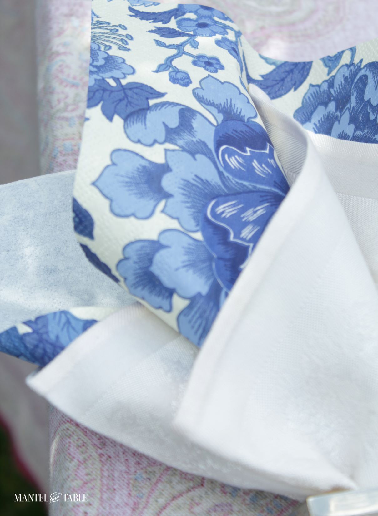 Super closeup of blue napkins in a tablescape