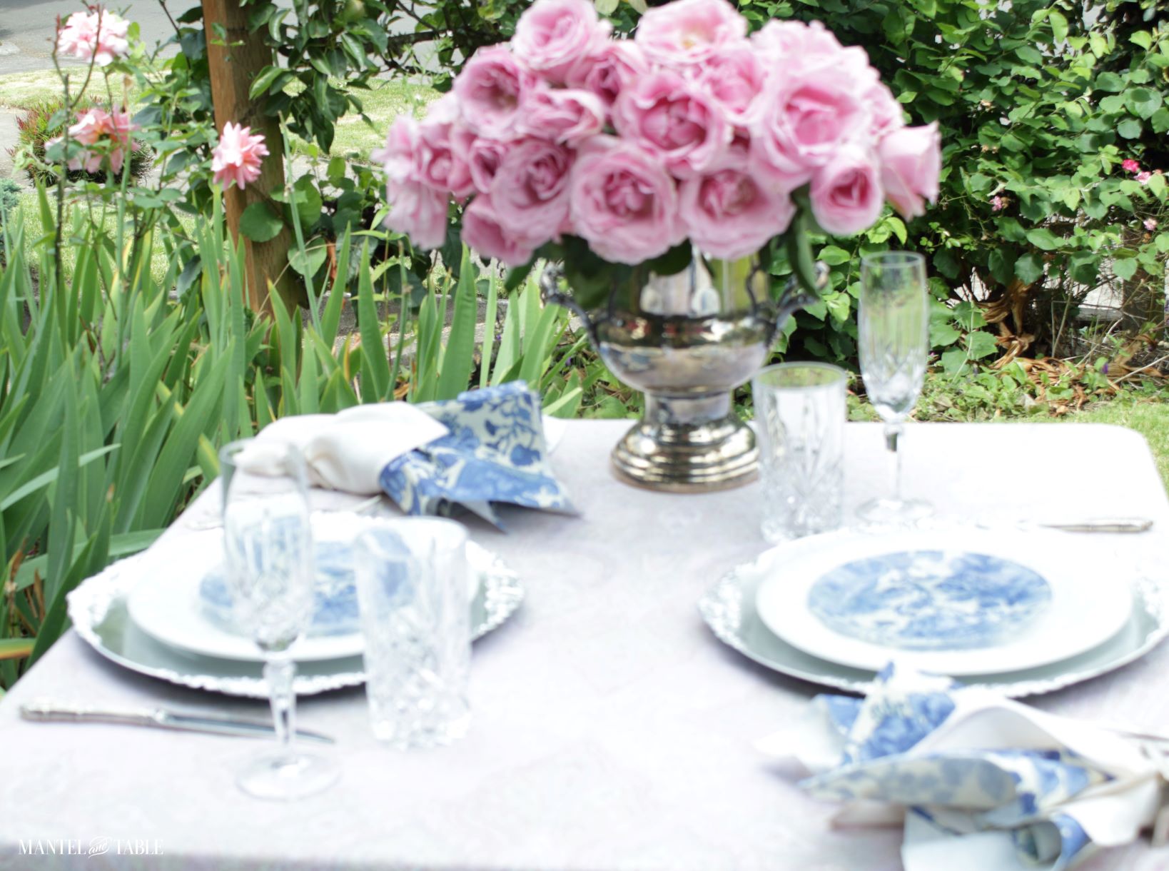 Pink roses and blue & white tablescape. A little blurry