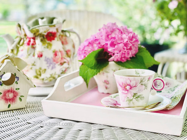 Teacup travels - teacup on tray with hydrangeas and teapot