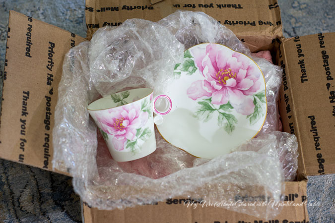 The Traveling Teacup arriving in So Cal in a battered box.