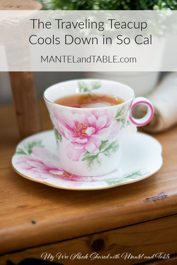 Pink flowered teacup on brown cabinet. Pinterest banner.