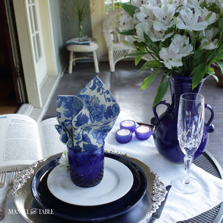Blue and white tablescape on the porch