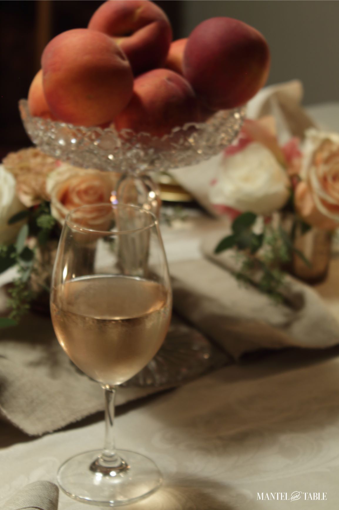 closeup of rosé wine with peaches