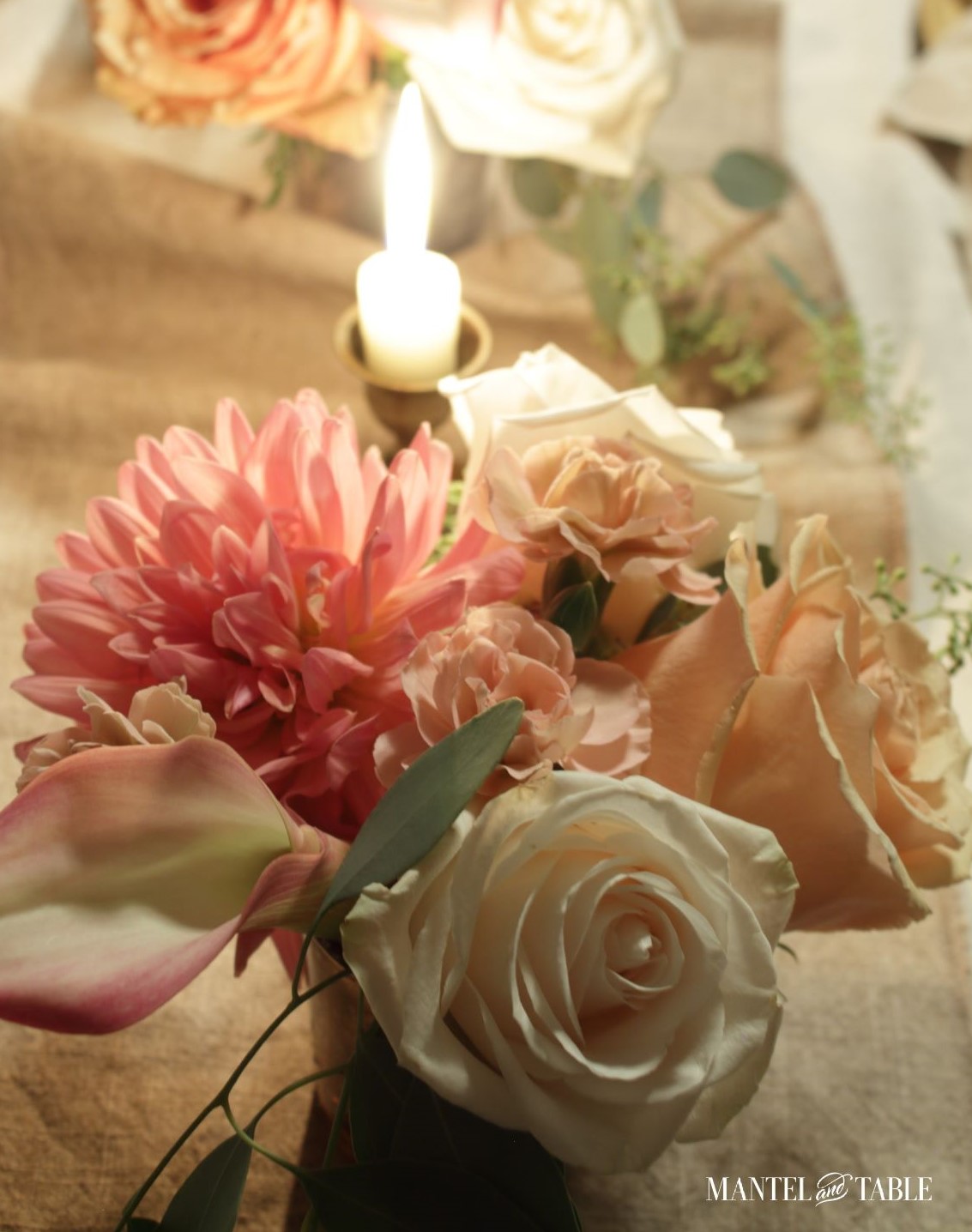 Pink and peach flowers, candle