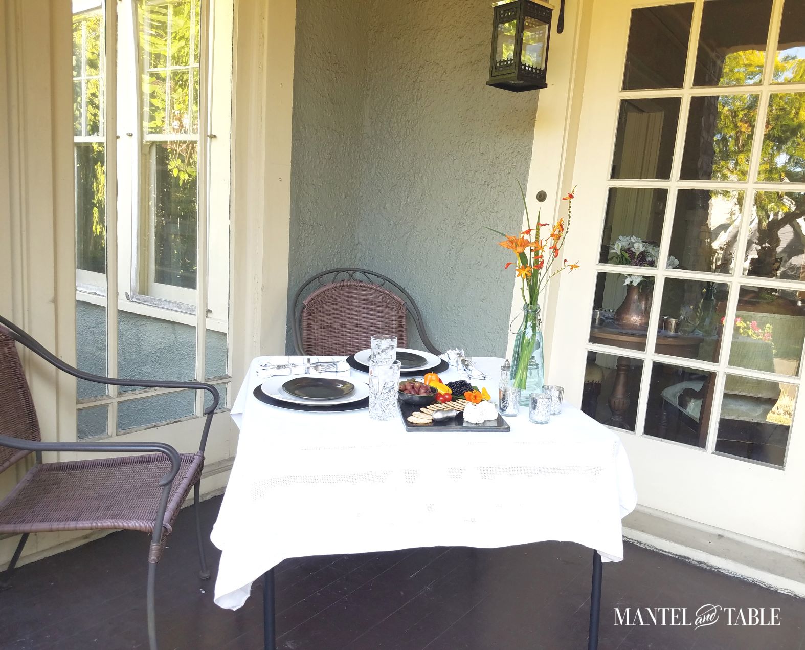 Set table with 2 chairs and flowers