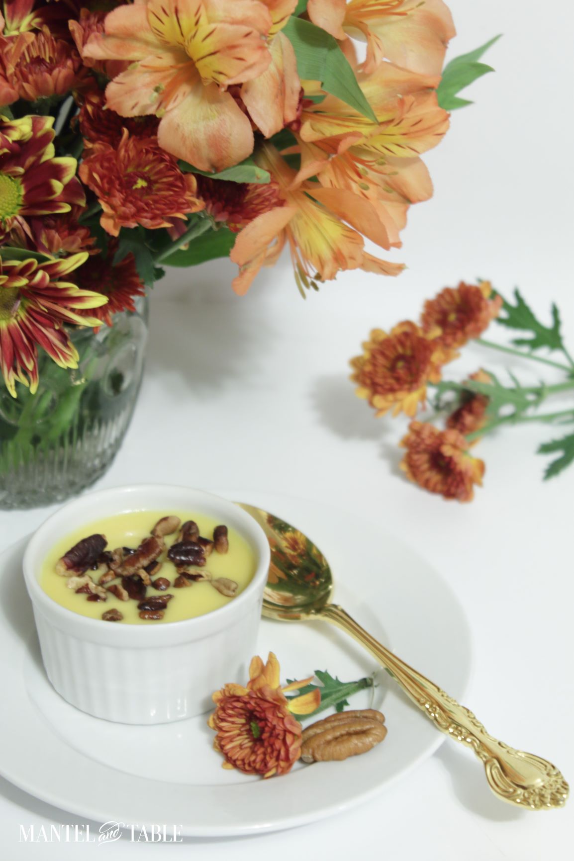 Full view of Pumpkin pot de creme on plate with garnish