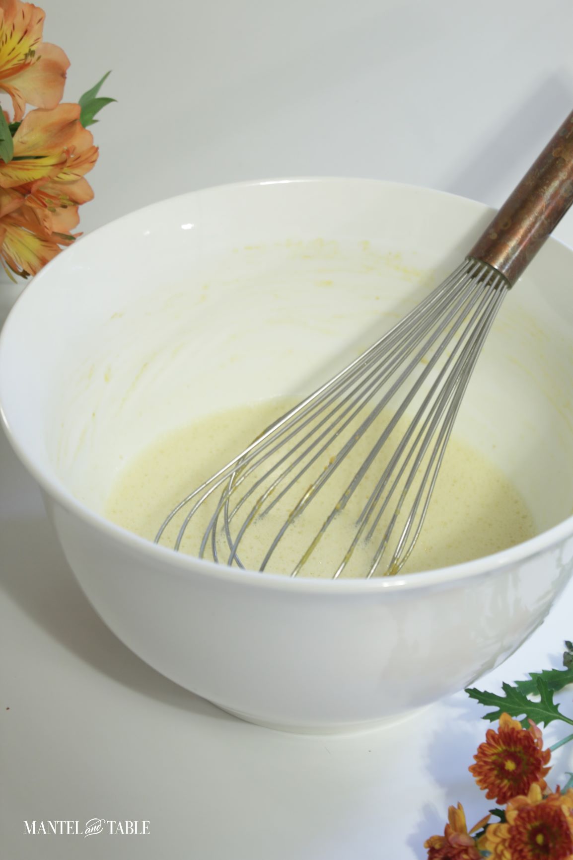 Closeup of Pumpkin pot de creme mixture in white bowl