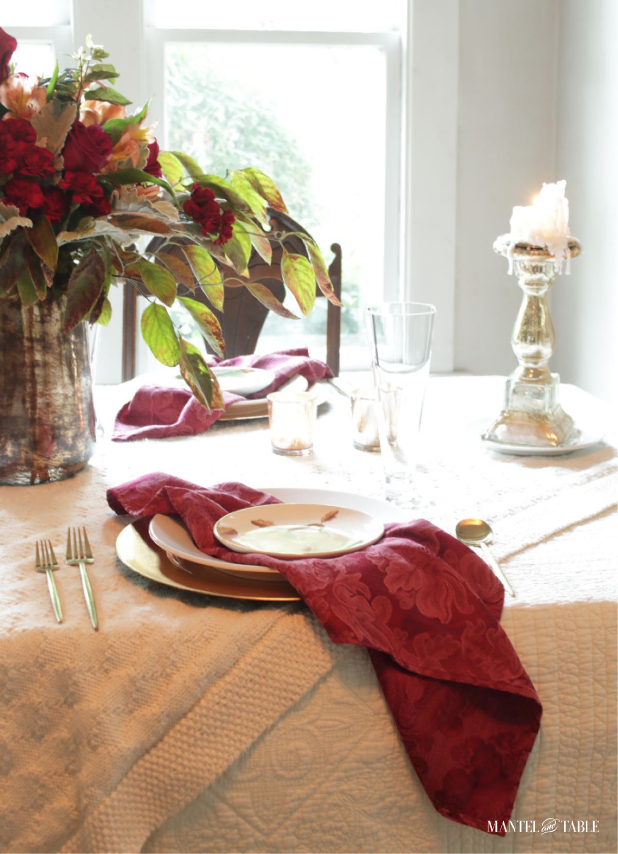 Close up of centerpiece with draping dogwood boughs