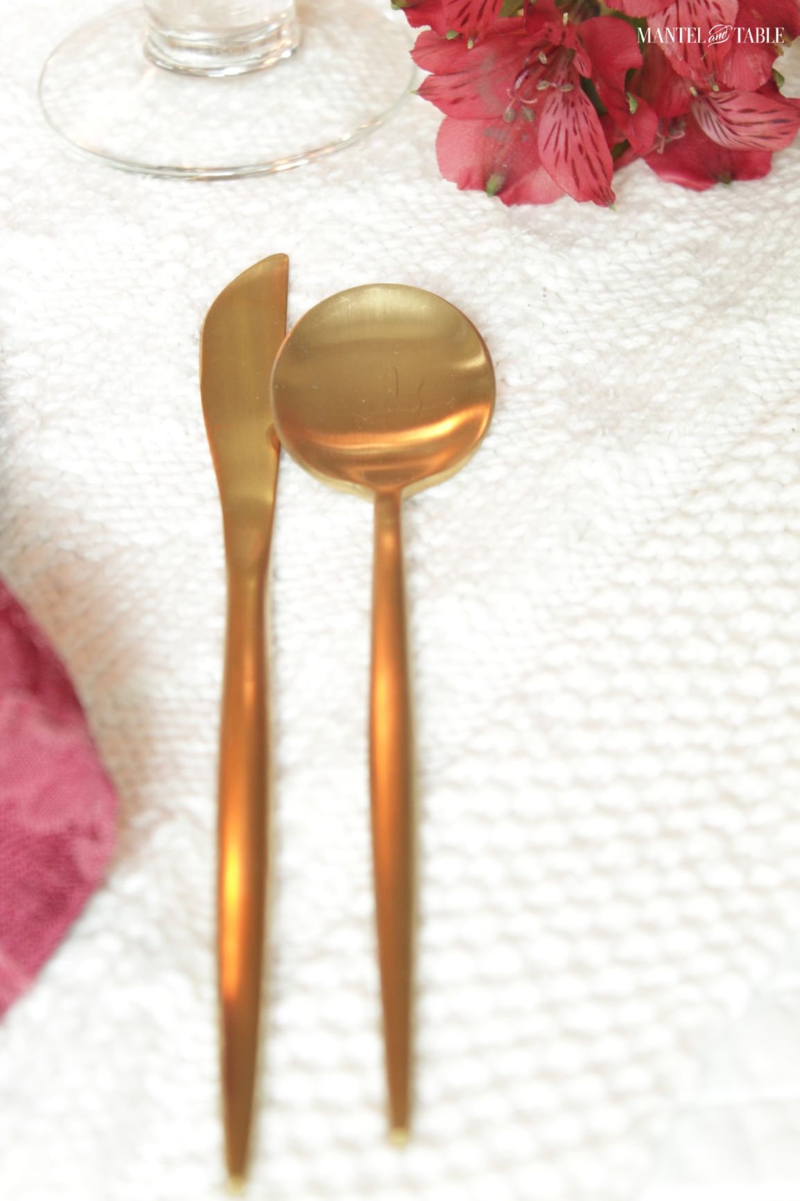 Closeup of gold knife and spoon