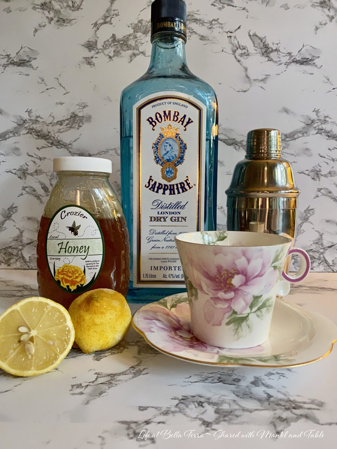 Historic estate cocktail ingredients with teacup