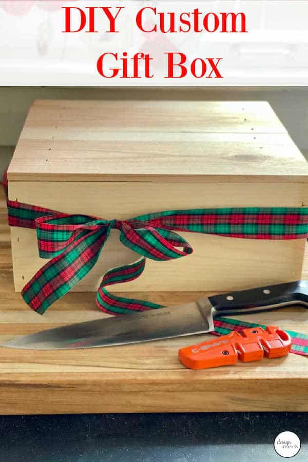 Custom wooden gift box tied with holiday ribbon from DesignMorsels.com