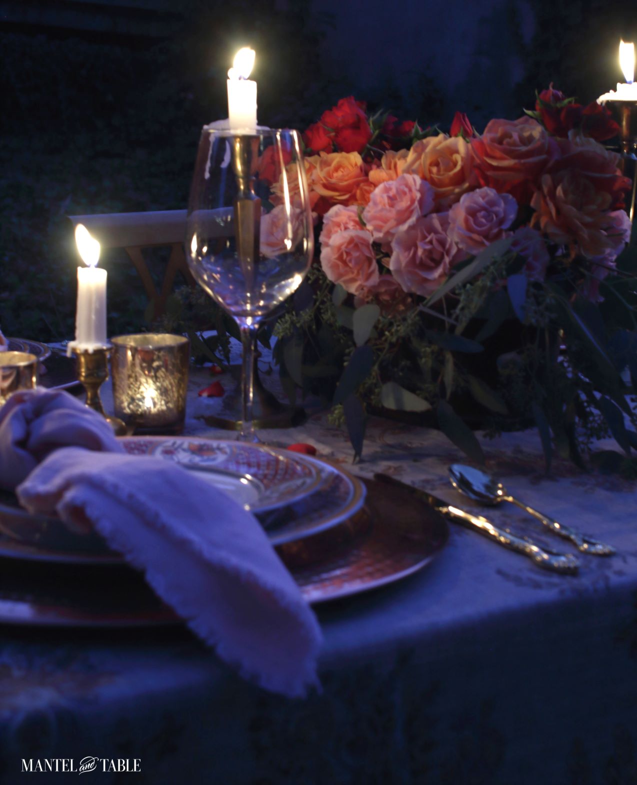 close up of plate stack and flowers