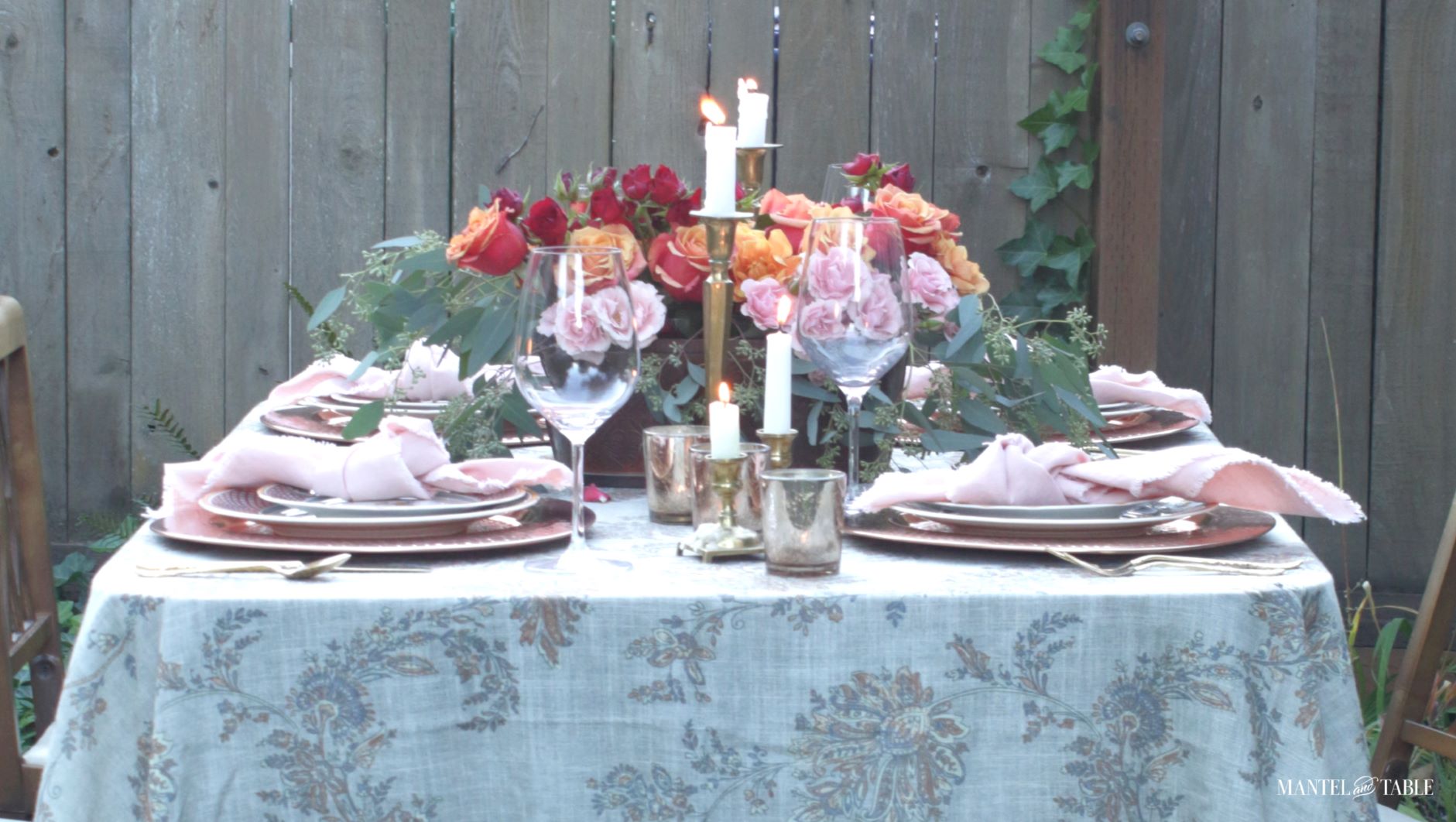 Slightly fuzzy photo of pink and orange tablescape