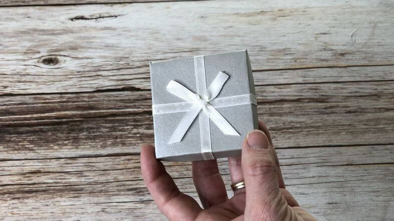 ChasCrazyCreations.com Shopping guide - hand holding wrapped gift