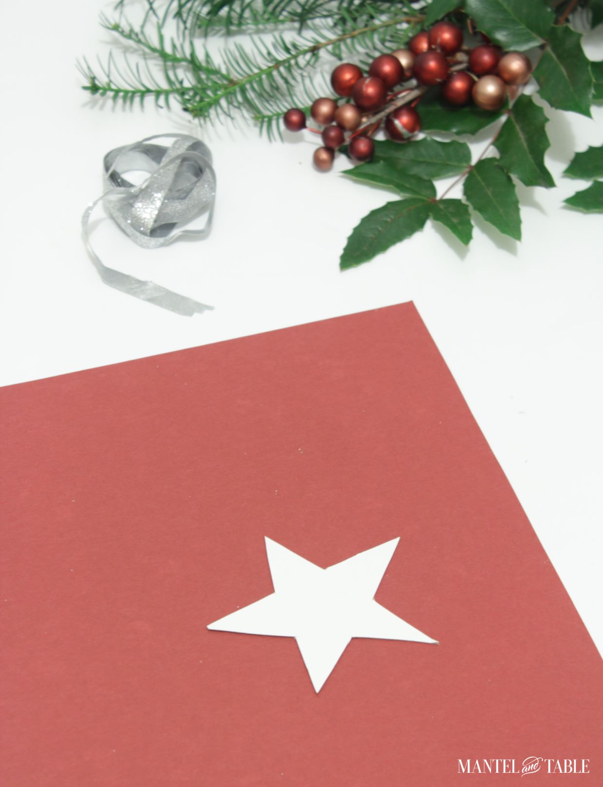 White star cutout against red background