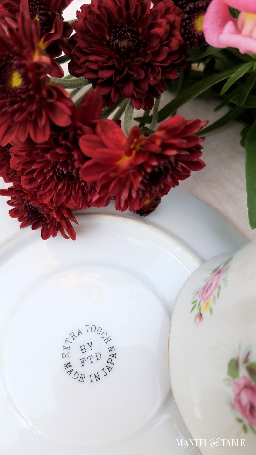Underside of saucer showing BY FTD backstamp