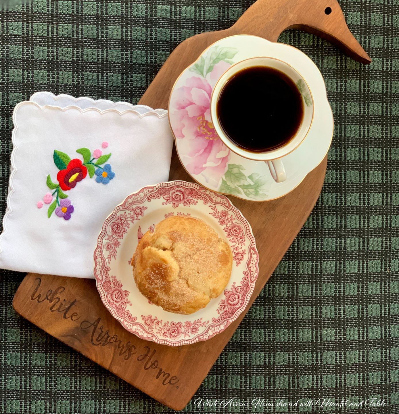 Coffee and muffin on duck shaped cutting board