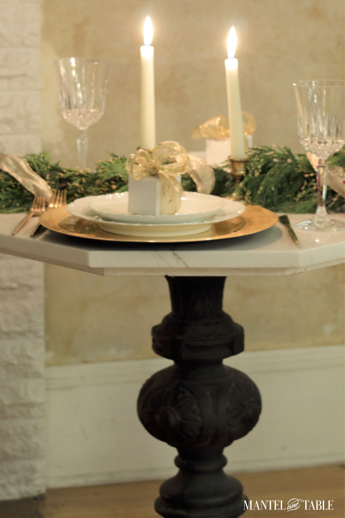 Closeup of white marble table and black iron base