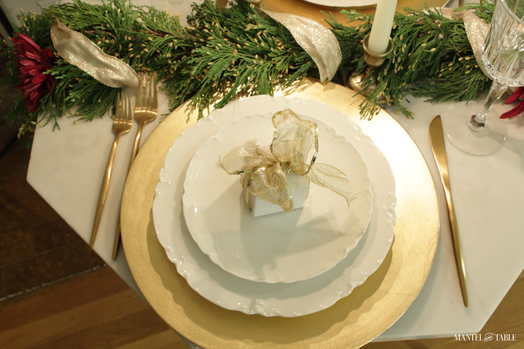 Tablescape for two - closeup of gold and white place setting