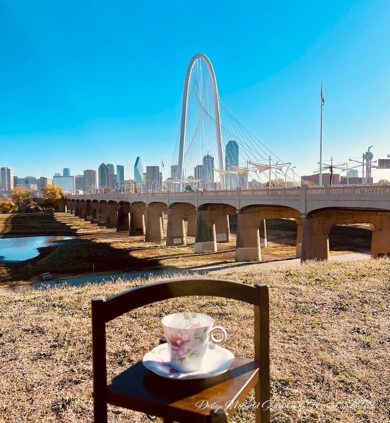 Margaret Hunt Hill bridge with Dallas in the background. Teacup in foreground
