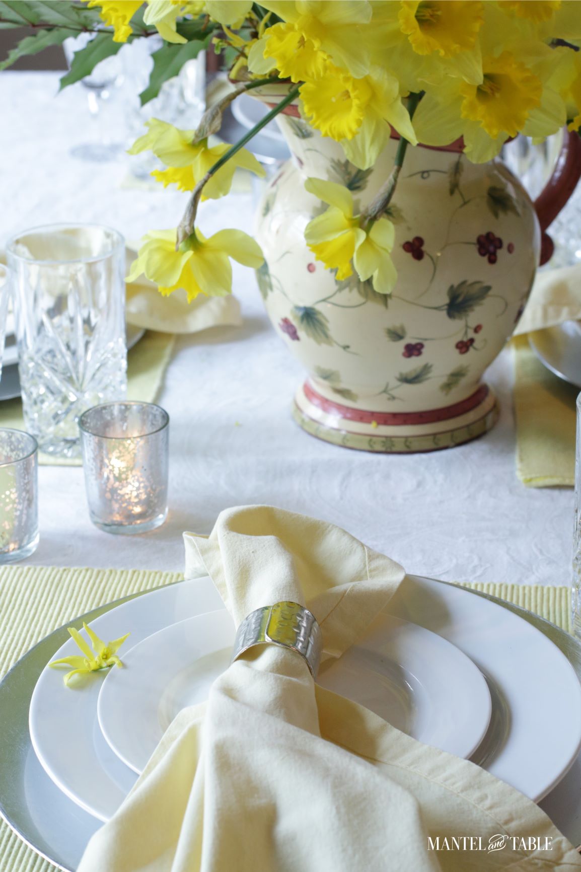 Closeup of plate stack in daffodil place setting