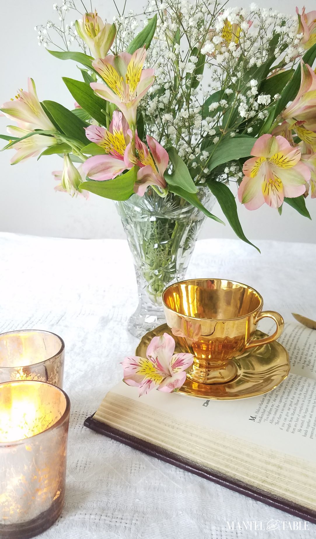 Gold teacup and saucer side view
