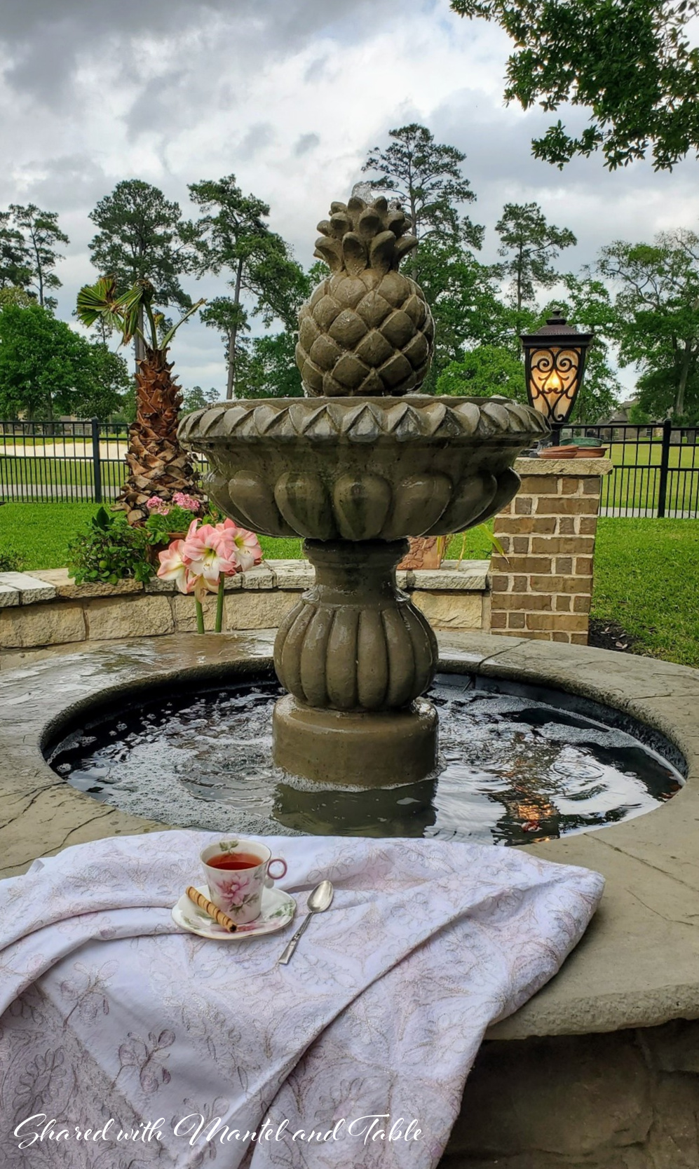 Garden fountain with teacup and saucer