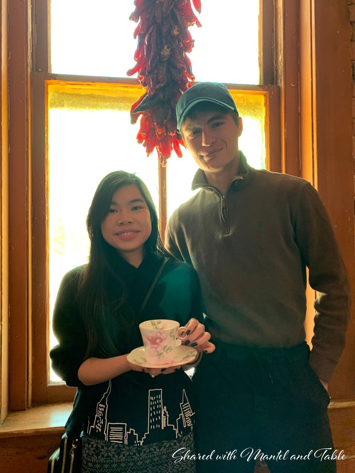 Portrait of handsome man, and pretty daughter, posing with The Traveling Teacup
