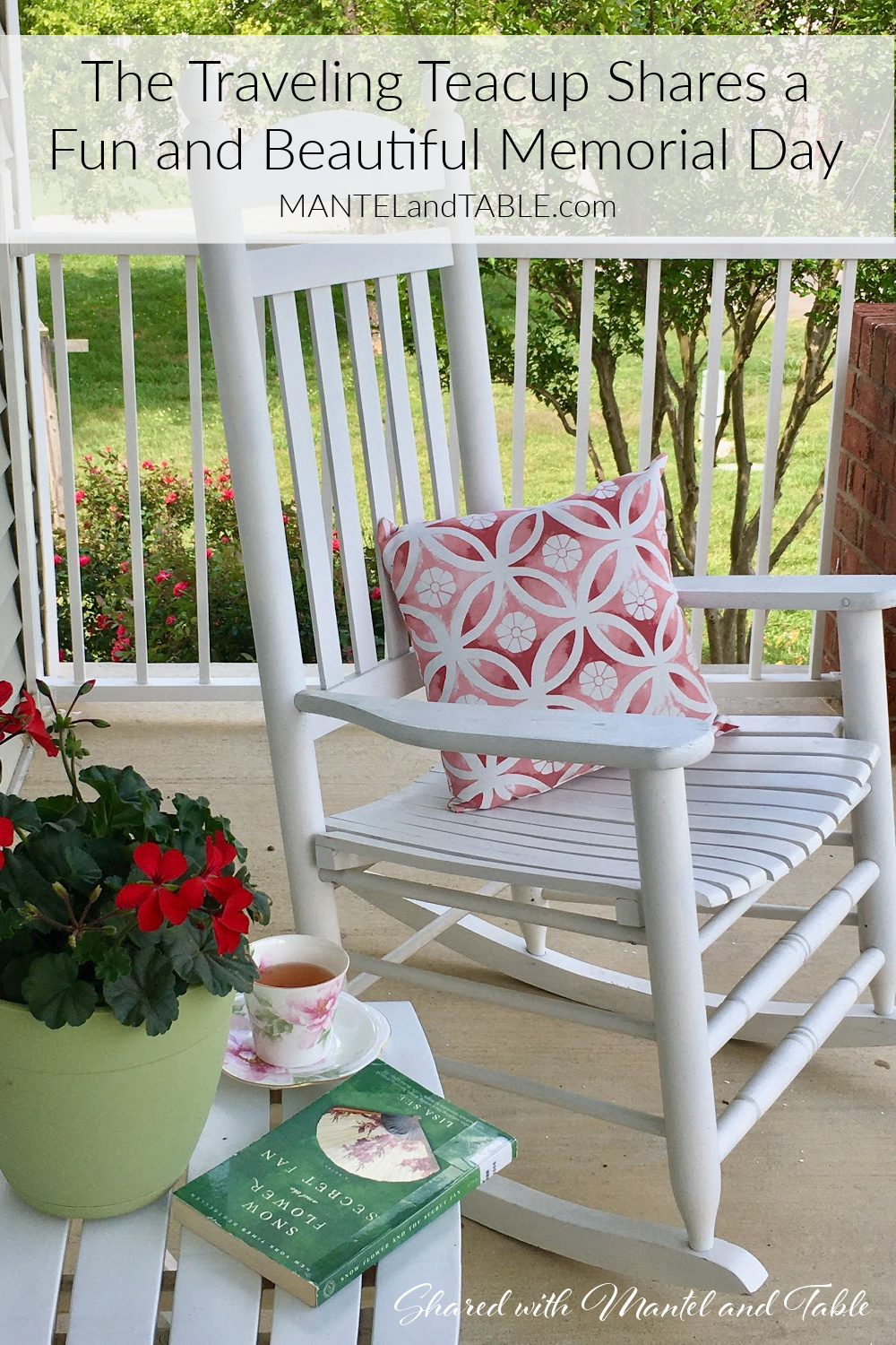 White rocker on porch with teacup, book and flowering plant on side table