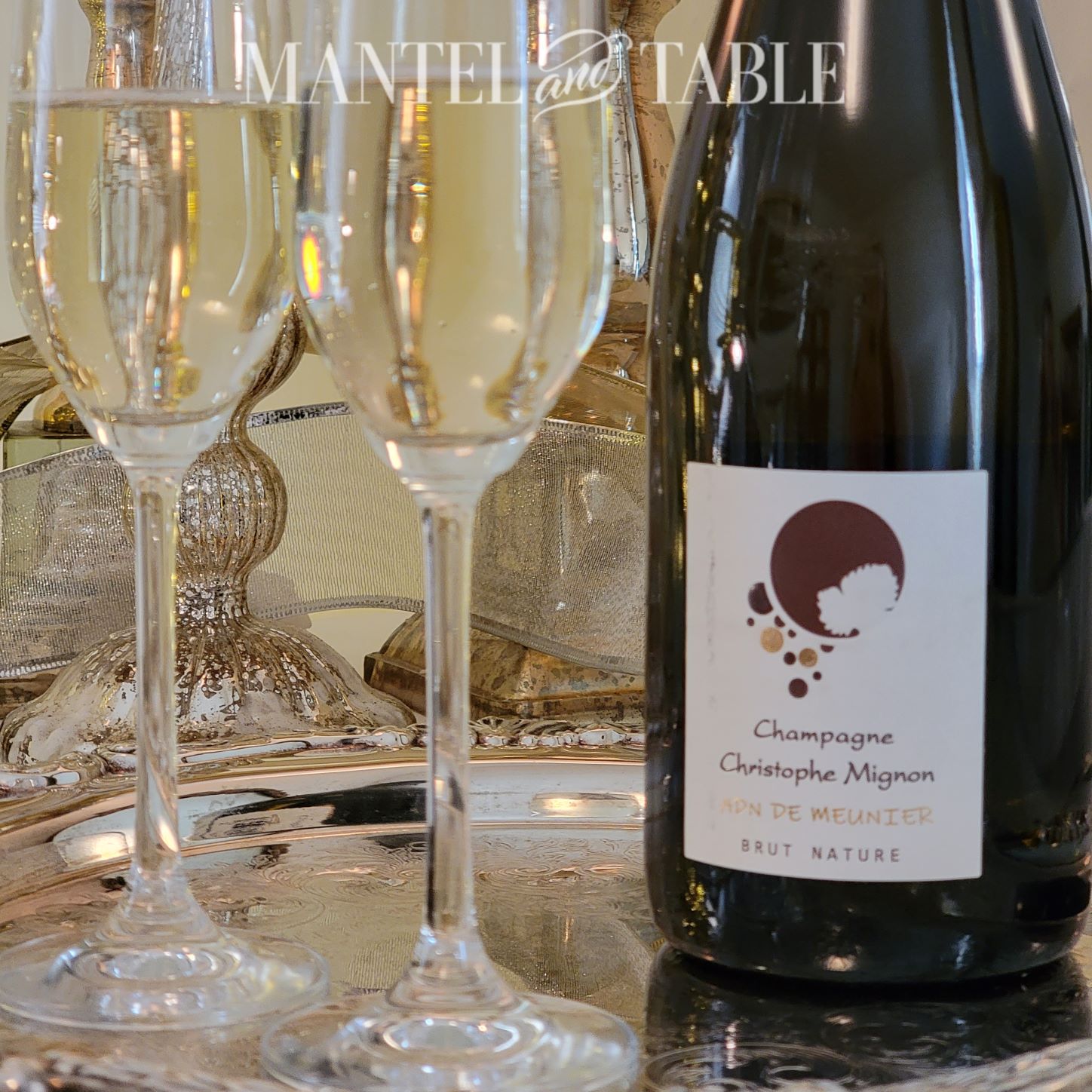 Closeup of champagne bottle and glassses