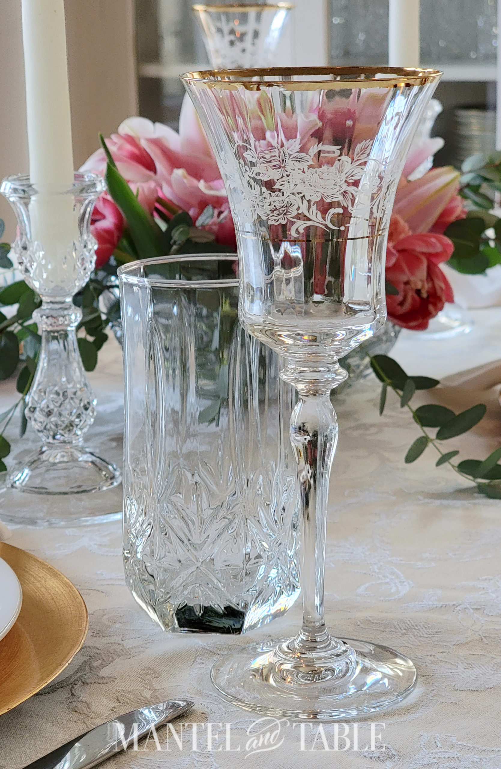 romantic table setting with cut crystal glasses